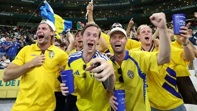 Sweden's fans celebrate after their team won