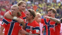 Image: Norway's Erling Haaland celebrates with team-mates after scoring his second goal against Brazil